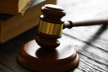 Judges gavel on wooden desk. Law firm concept.