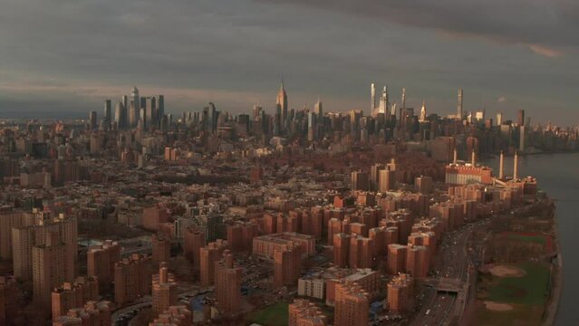 Aerial slider shot of Empire State Building Manhattan skyline New York