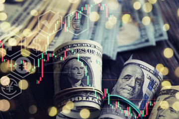 United States dollars. Pile of hundred USD banknotes. Green toned photo with selective focus