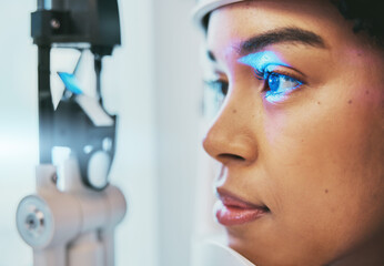 Optometry, medical and eye exam with black woman and consulting for vision, healthcare and glaucoma check. Laser, light and innovation with face of patient and machine for scanning and ophthalmology