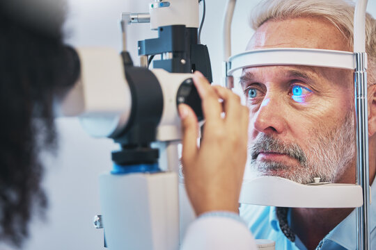 Ophthalmology, medical and eye exam with old man and consulting for vision, healthcare and glaucoma check. Laser, light and innovation with face of patient and machine for scanning and optometry