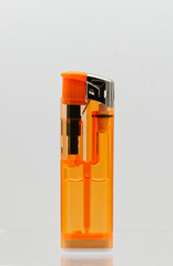 Orange transparent lighter isolated on white background.