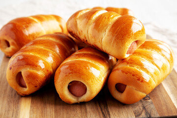 Homemade Kolache Rolls Ready to Eat on a Wooden Board, side view. Close-up.