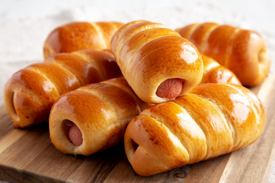 Homemade Kolache Rolls Ready to Eat on a Wooden Board, side view.
