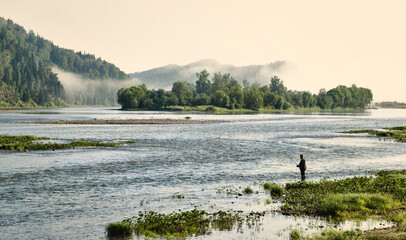 mystical forest in fog, mountain river and fantastic landscape