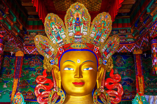 Beautiful and colorful golden buddha statue that call Maitreya Buddha statue in Thiksey monastery temple.Raspectful Bhudda image in Ladakh,India.Art of asia in vintage style.