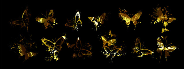 Obraz premium Set of golden butterflies on a black background. Vector illustration