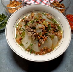A bowl of freshly prepared vegetable soup (Soto Bandung, an ideal meal for healthy eating and wellbeing.