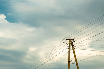 Power electric pole with line wire on colored background close up