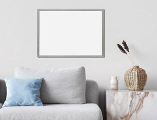 Empty horizontal frame mockup in modern minimalist interior with plant in trendy vase on white wall...