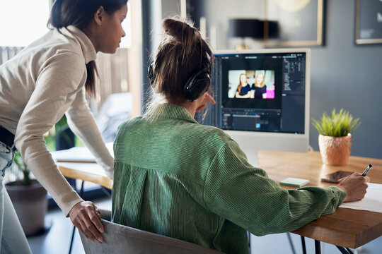 Freelancers Working On Desktop PC At Home Office