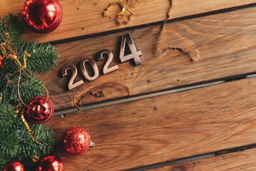 happy new year 2024 background new year holidays card with bright lights,gifts and bottle of...
