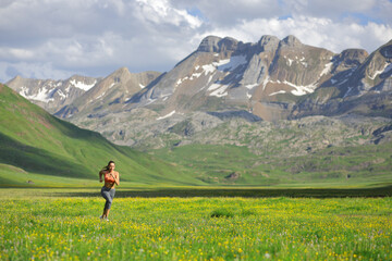 Fototapeta na wymiar Runner running in a beautiful mountain