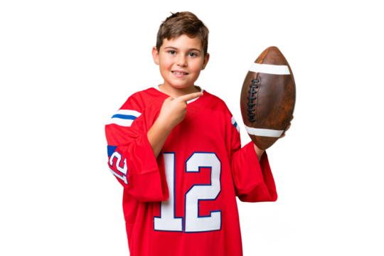 Little caucasian kid playing rugby over isolated chroma key background and pointing it - Powered by Adobe