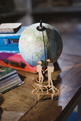old globe on a wooden table