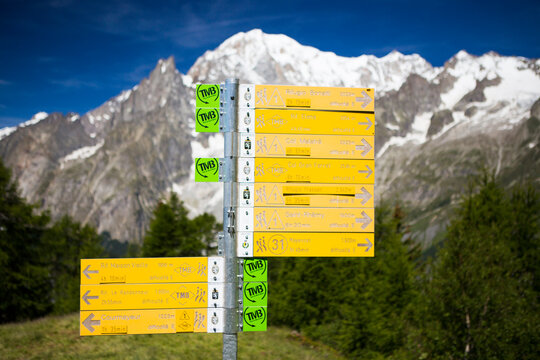 A sign post with directions of hiking trails in the Val Ferret near Courmayeur.