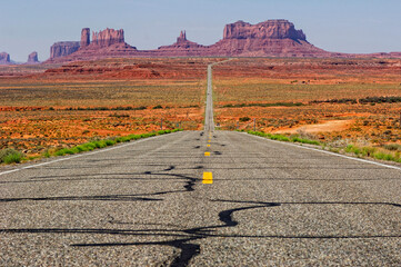 a road leading to Monument Valley