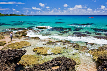 Beautiful scenery of Baishawan coastal reef and sea waves with the azure sky in the Kenting...