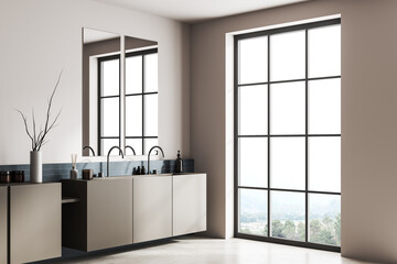 Corner view on bright bathroom interior with panoramic window