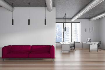 Front view on bright office room interior with computers