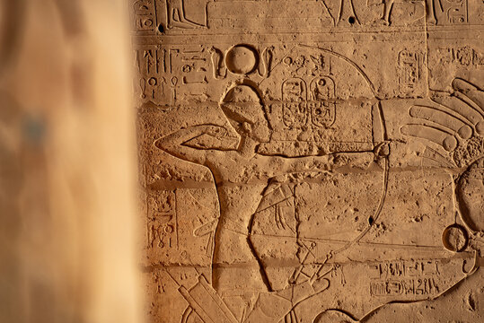 Hieroglyphic relief details from the Ramesseum, memorial temple or mortuary temple of Egyptian Pharaoh Ramesses II, part of the Theban Necropolis on the West Bank of the Nile, Luxor, Upper Egypt.