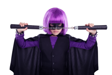 A superhero vigilante cute girl with nunchucks for fighting. A little girl playing super hero with martial art karate weapon and purple hair isolated on a png background.