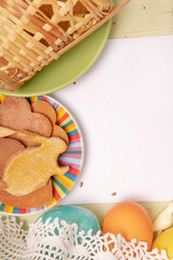 White empty list mockup with Easter colored eggs and cookies