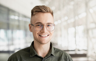 Young handsome man portrait, Cheerful laughing businessman smiling indoor, People, enjoy life,...