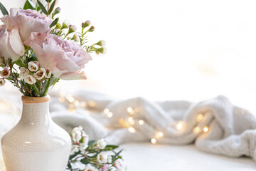 Spring composition with a bouquet of flowers in a vase, close-up.