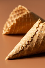 Close-up of waffle cones, creative macro concept of sweets and food.
