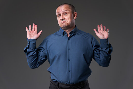 Impartial businessman on gray background