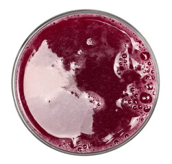 Pomegranate juice in glass cup isolated on white, top view