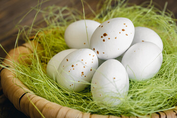Easter composition with eggs in a decorative nest.