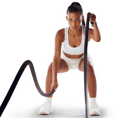 A fit woman doing cardio workout with ropes, exercising for fitness training and looking sporty. An active and young female athlete doing exercise routine isolated on a png background.