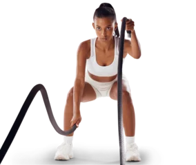 Gordijnen A fit woman doing cardio workout with ropes, exercising for fitness training and looking sporty. An active and young female athlete doing exercise routine isolated on a png background. © peopleimages.com