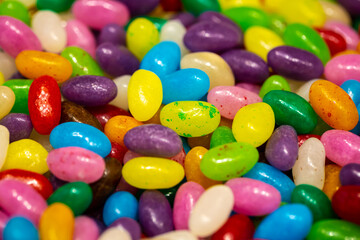 Multicolored chewy candies, candy background, macro shot.