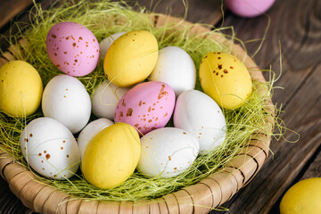 Easter composition with eggs in a decorative nest.