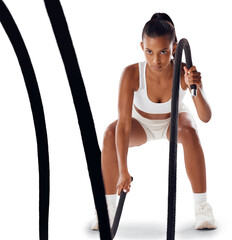 An active or fitness woman in a routine workout with a battle rope. A sporty athletic female...