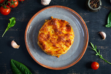 Classic lasagna with minced chiken bolognese sauce and bechamel sauce. Top view