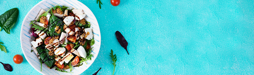 Fresh salad with chicken, tomatoes, herbs and feta cheese. Healthy food. Top view