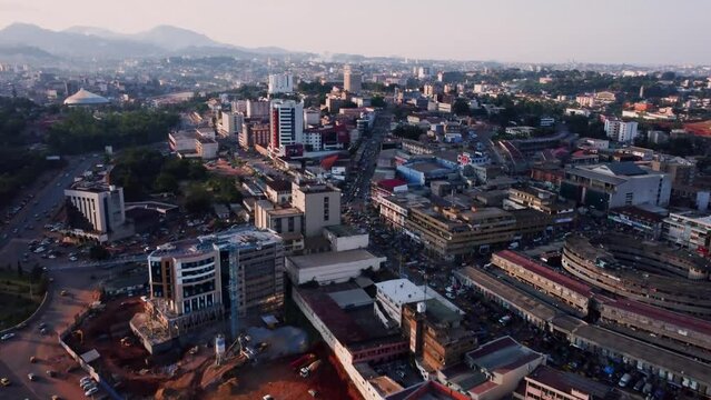 Aerial flyover over the cityscape of downtown Yaounde, sunny Cameroon, Africa