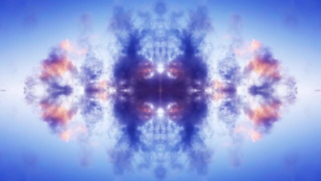 Moving clouds in the sky at sunset with reflection and mirror effect as in a kaleidoscope. Beautiful mirrored pattern of clouds in a colorful sky at sunset. 4k time lapse video. 