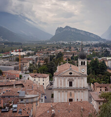 Fototapeta na wymiar Riva del Garda aerial panoramic view from Arco Castle. Riva is a town at the northern tip of the Lake Garda, Trentino Alto Adige region in Italy. Europe tourism