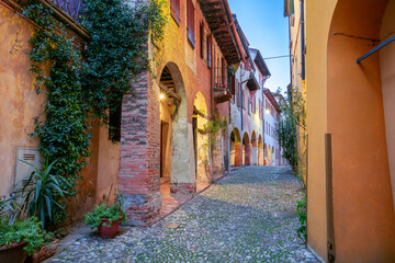 Fototapeta na wymiar Treviso, Italy. Cityscape image of colorful street located in old town Treviso, Italy at sunset.