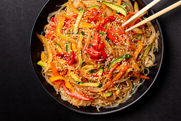Easy Japchae , Korean glass noodle made with sweet potato starch,  stir fried with vegetables. ...