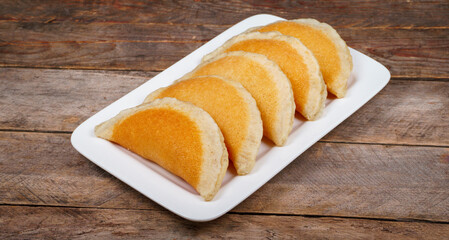 Qatayef, Traditional Arabic Ramadan Sweets on plate.Top view
