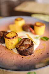 Veal filet mignon with fried potatoes. Delicious 