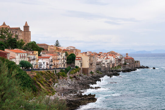 The fishing village of Cefalu in Sicily / The fishing village of Cefalu with the mighty cathedral on the island of Sicily, Italy.