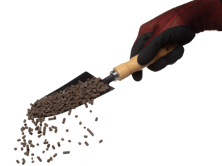 Fertilizer Organic natural fly fall in shovel glove, tube compost fertilizer for planting float in air. Organic fertilizer throw in mid air. White background isolated high speed freeze motion