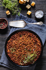 Tasty Bake with meat, mushrooms, cheese, onion